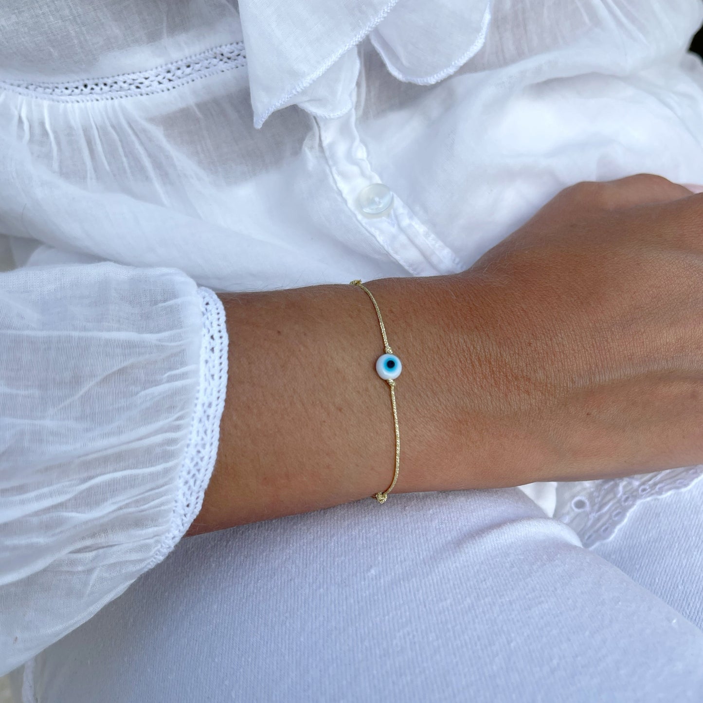 Bracelet Grigri blanc - couleur du fil au choix